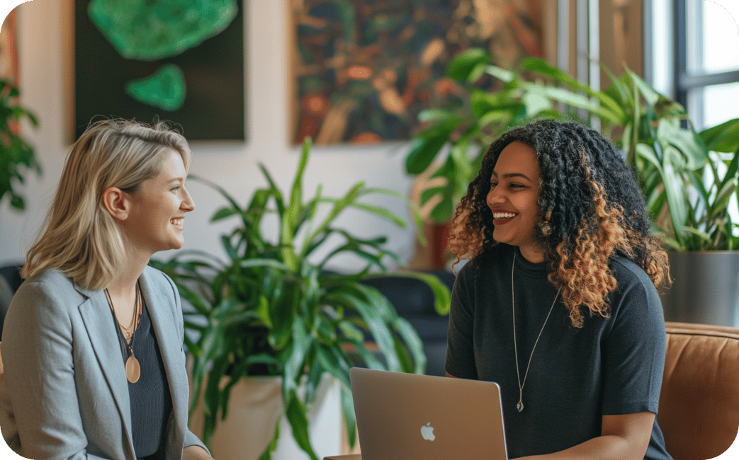 Recruiter and Candidate smiling during an interview